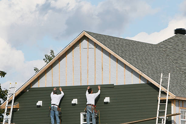 Professional Siding Contractor technician working in Cortland, NY